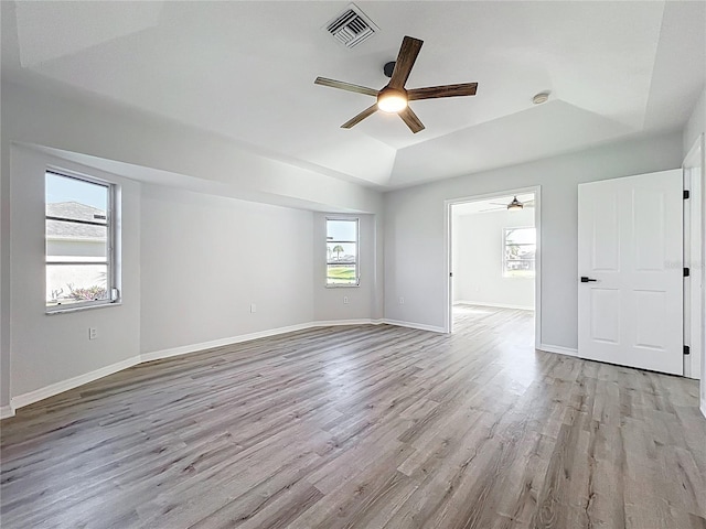 142 Broadmoor Ln, Rotonda West, FL 33947 - unfurnished room featuring a ceiling fan, healthy amount of natural light, light wood finished floors, and vaulted ceiling