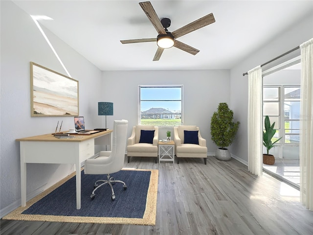 142 Broadmoor Ln, Rotonda West, FL 33947 - home office with wood finished floors and ceiling fan