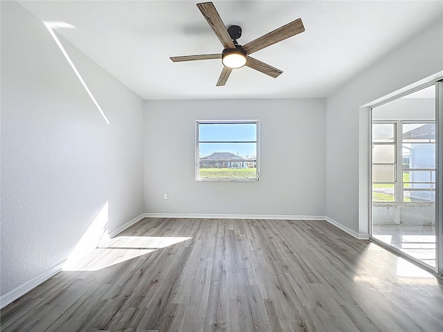 142 Broadmoor Ln, Rotonda West, FL 33947 - unfurnished room with light wood-style floors and a ceiling fan