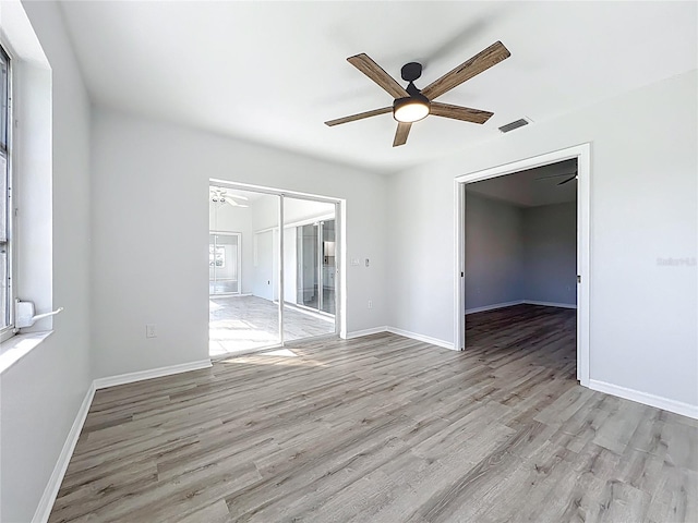 142 Broadmoor Ln, Rotonda West, FL 33947 - unfurnished room featuring ceiling fan and wood finished floors