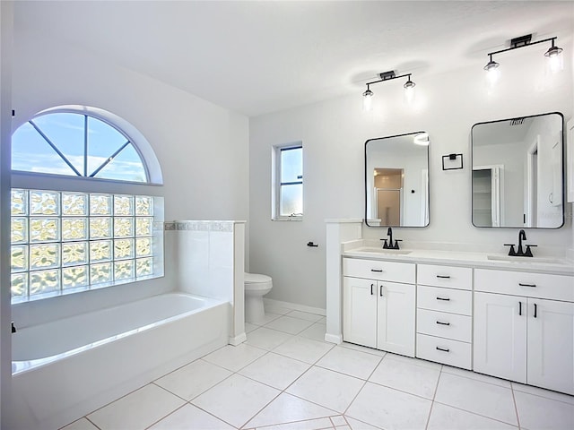 142 Broadmoor Ln, Rotonda West, FL 33947 - full bathroom featuring double vanity, a garden tub, and tile patterned floors