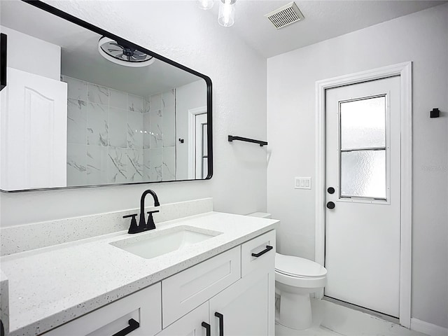 142 Broadmoor Ln, Rotonda West, FL 33947 - full bath featuring marble look tile flooring, vanity, and a shower