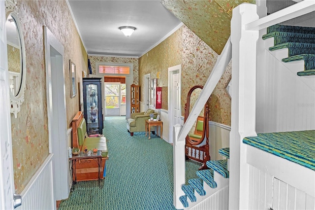 430 W Minnehaha Ave, Clermont, FL 34711 - hall featuring wallpapered walls, carpet flooring, stairway, crown molding, and wainscoting
