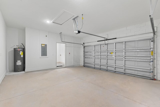2451 W Menores Dr, Citrus Springs, FL 34434 - garage featuring water heater, electric panel, and a garage door opener