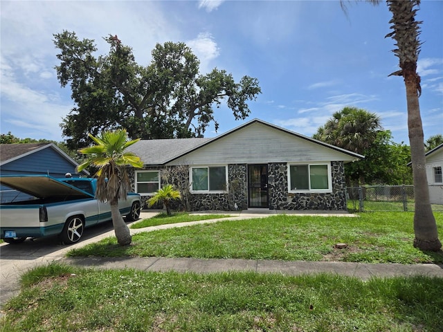 2308 18th St E, Bradenton, FL 34208 - view of front facade featuring stone siding