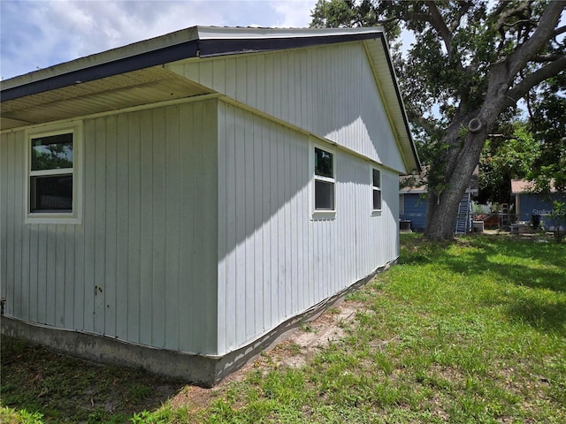 2308 18th St E, Bradenton, FL 34208 - view of property exterior with a lawn