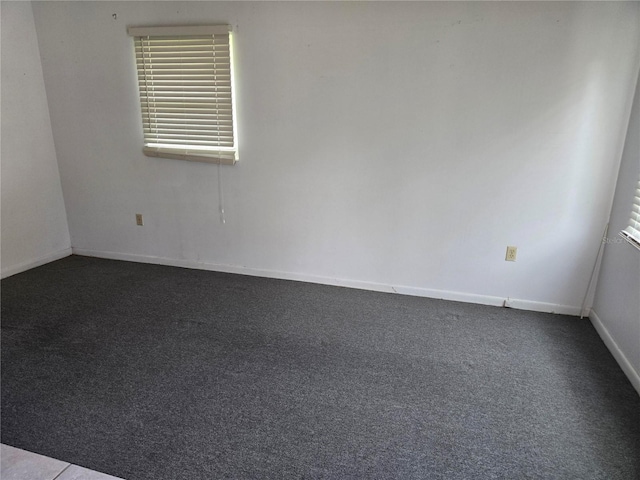 2308 18th St E, Bradenton, FL 34208 - spare room with dark carpet