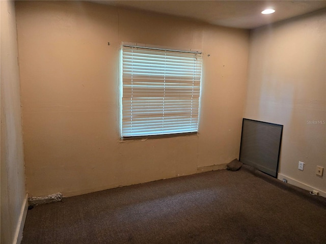 2308 18th St E, Bradenton, FL 34208 - carpeted empty room featuring plenty of natural light and recessed lighting