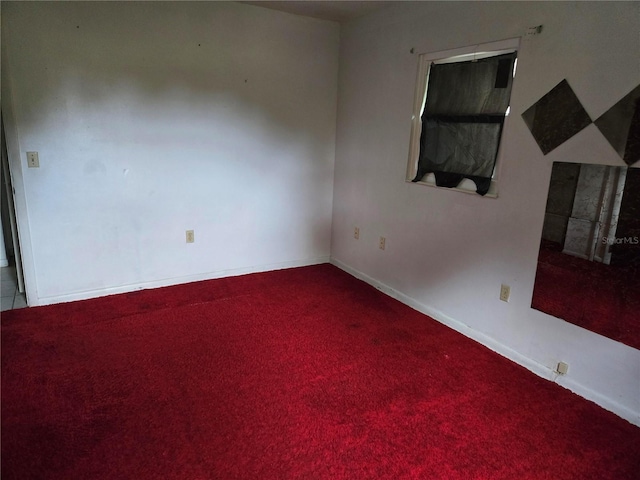 2308 18th St E, Bradenton, FL 34208 - empty room with carpet floors and baseboards
