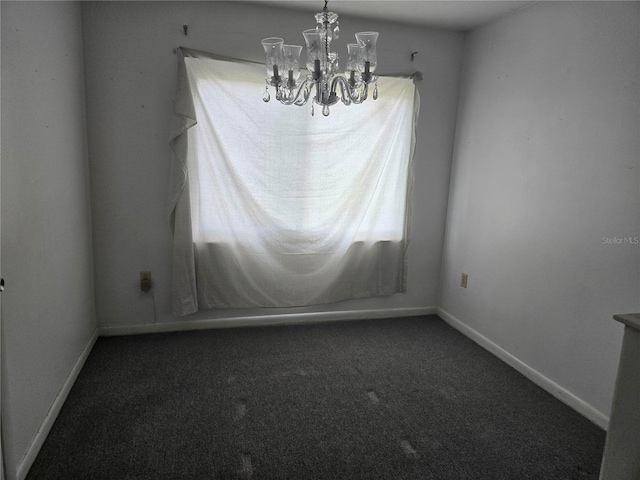 2308 18th St E, Bradenton, FL 34208 - carpeted empty room with a chandelier and healthy amount of natural light