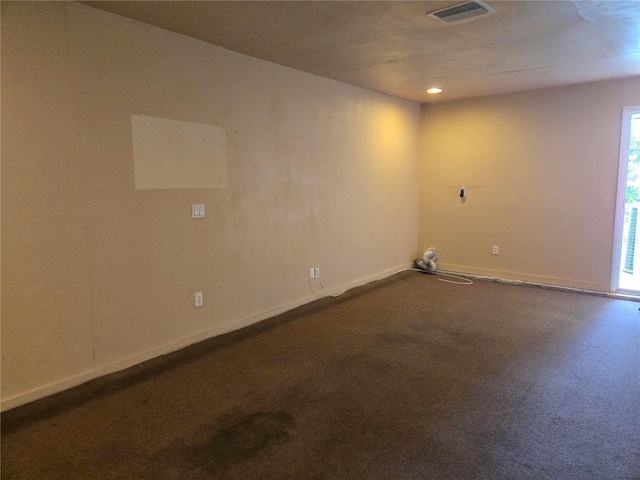 2308 18th St E, Bradenton, FL 34208 - spare room with baseboards and dark colored carpet