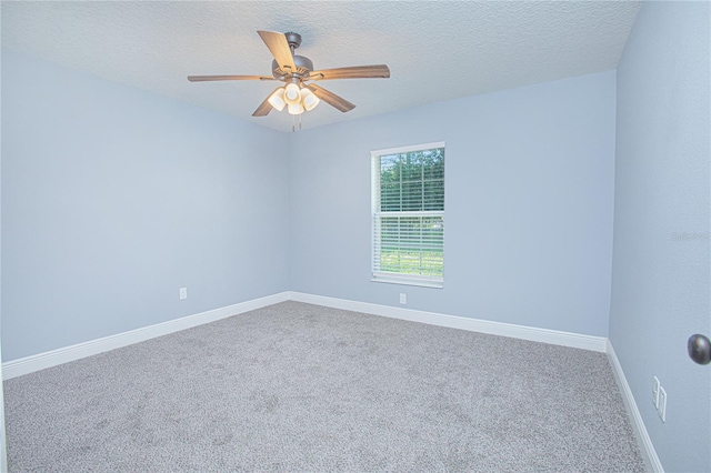4911 NE 7th St, Ocala, FL 34470 - carpeted empty room with ceiling fan and a textured ceiling