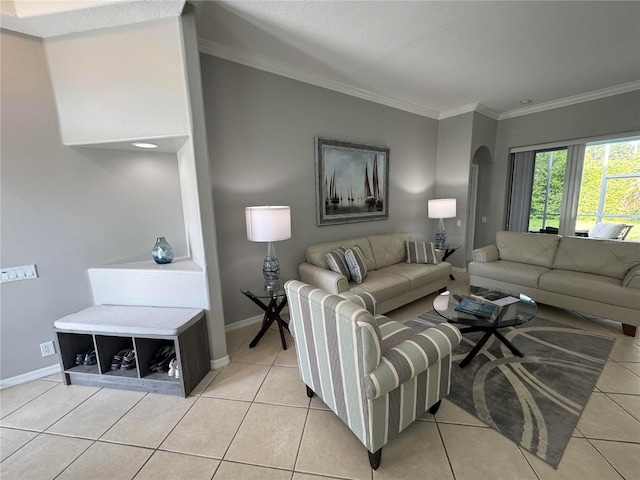 1884 Coconut Palm Cir, North Port, FL 34288 - living area with crown molding, light tile patterned floors, and arched walkways