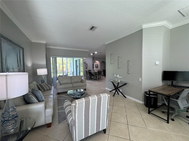 1884 Coconut Palm Cir, North Port, FL 34288 - living room featuring crown molding, light tile patterned floors, a textured ceiling, arched walkways, and an office area