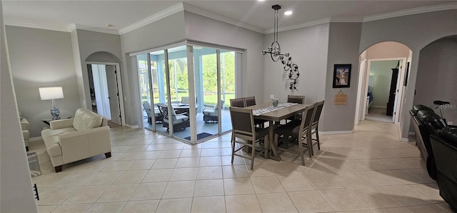 1884 Coconut Palm Cir, North Port, FL 34288 - dining space with arched walkways, light tile patterned floors, ornamental molding, and recessed lighting
