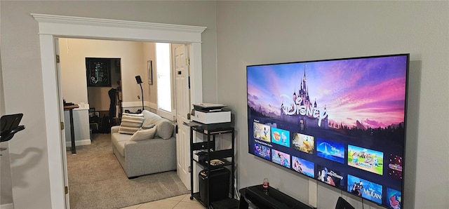 1884 Coconut Palm Cir, North Port, FL 34288 - cinema featuring carpet floors, tile patterned floors, and a chandelier