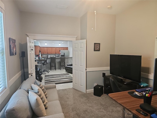 1884 Coconut Palm Cir, North Port, FL 34288 - living area featuring an office area and light colored carpet
