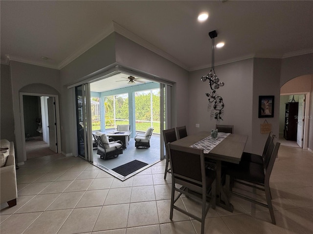 1884 Coconut Palm Cir, North Port, FL 34288 - dining room featuring arched walkways, crown molding, light tile patterned floors, ceiling fan, and recessed lighting