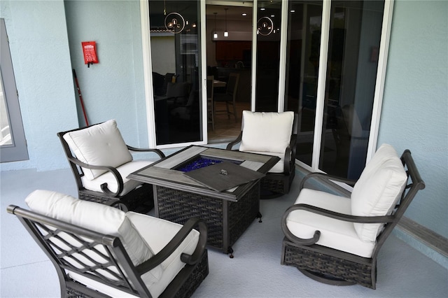 1884 Coconut Palm Cir, North Port, FL 34288 - view of patio / terrace featuring an outdoor fire pit