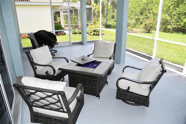 1884 Coconut Palm Cir, North Port, FL 34288 - sunroom / solarium with plenty of natural light and an outdoor living space with a fire pit