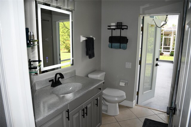 1884 Coconut Palm Cir, North Port, FL 34288 - bathroom with vanity and tile patterned flooring