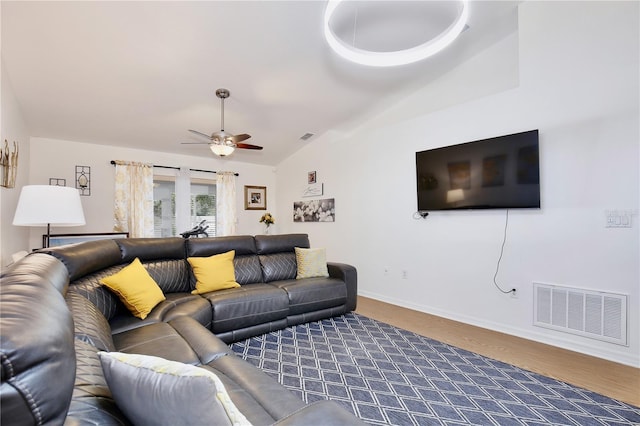 3415 Celena Cir, Saint Cloud, FL 34769 - living area featuring vaulted ceiling, wood finished floors, and ceiling fan