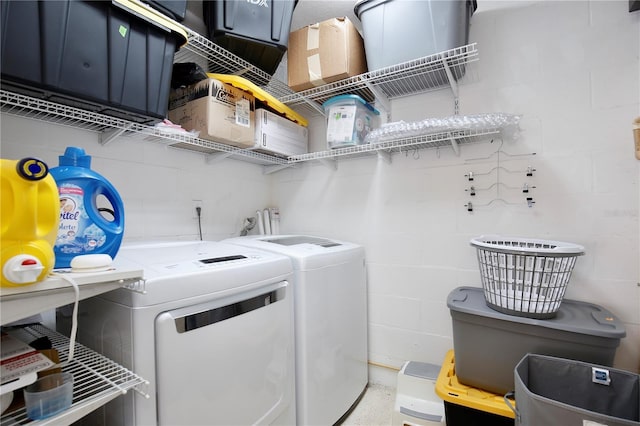 3415 Celena Cir, Saint Cloud, FL 34769 - washroom featuring washer and dryer and concrete block wall