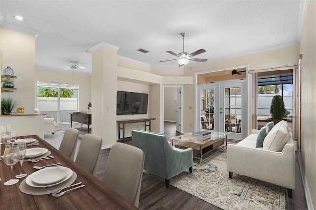 14558 Mandolin Dr, Orlando, FL 32837 - living area with a ceiling fan, wood finished floors, ornamental molding, french doors, and recessed lighting