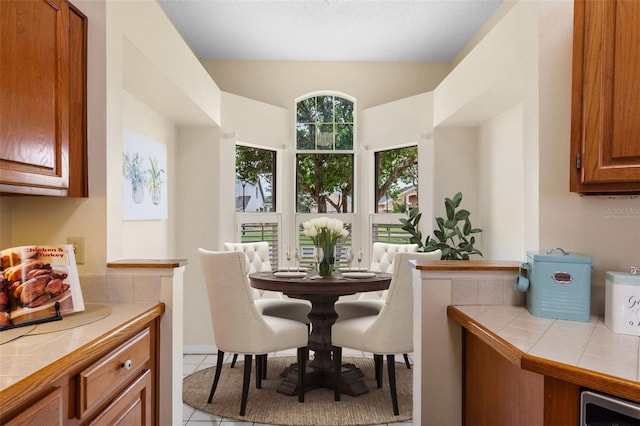 14558 Mandolin Dr, Orlando, FL 32837 - dining room with tile patterned flooring
