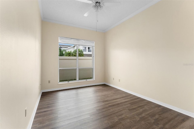 14558 Mandolin Dr, Orlando, FL 32837 - spare room with dark wood-style flooring, ceiling fan, and crown molding