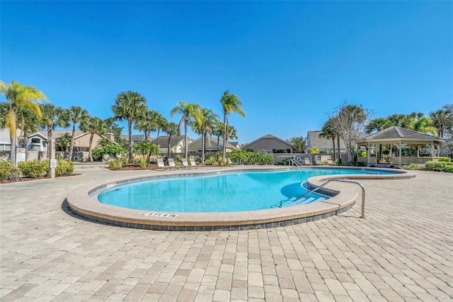 14558 Mandolin Dr, Orlando, FL 32837 - community pool featuring a gazebo and a residential view