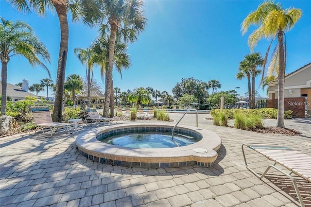 14558 Mandolin Dr, Orlando, FL 32837 - view of swimming pool with an in-ground hot tub