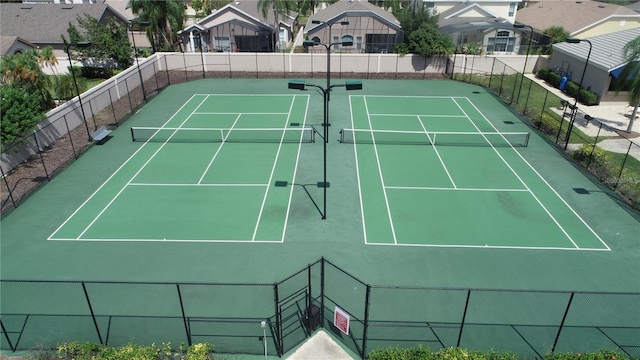 14558 Mandolin Dr, Orlando, FL 32837 - view of tennis court with a residential view and community basketball court
