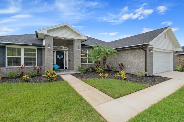 28 Noah Blvd, Flagler Beach, FL 32136 - ranch-style house with an attached garage, a front yard, brick siding, and driveway