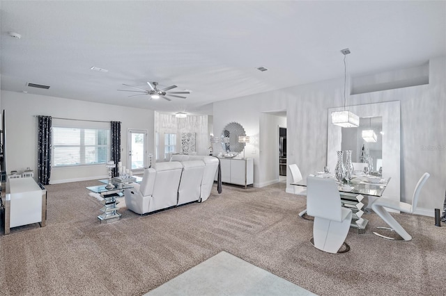 28 Noah Blvd, Flagler Beach, FL 32136 - carpeted living room featuring a ceiling fan and baseboards