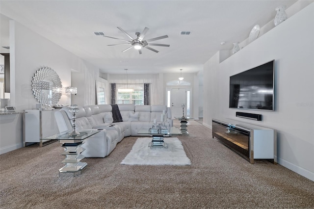28 Noah Blvd, Flagler Beach, FL 32136 - living area with ceiling fan and carpet