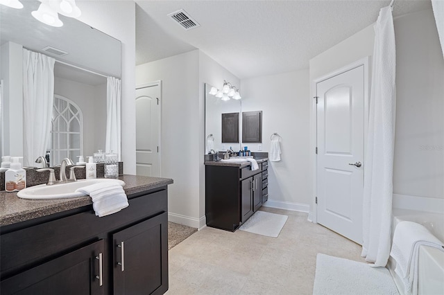 28 Noah Blvd, Flagler Beach, FL 32136 - full bath with two vanities and a bathtub