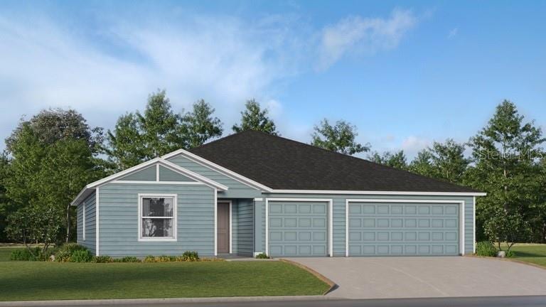 8366 SW 41st Ter, Ocala, FL 34476 - view of front of house with concrete driveway, an attached garage, and a front yard