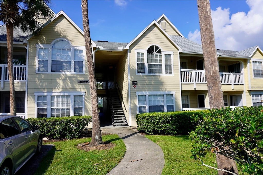 1031 S Hiawassee Rd Unit 2514, Orlando, FL 32835 - view of building exterior with stairs