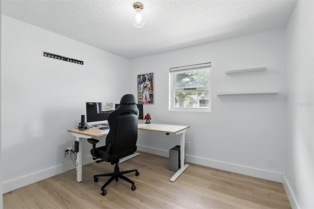 4611 Cranston Pl, Orlando, FL 32812 - office with light wood-type flooring and a textured ceiling