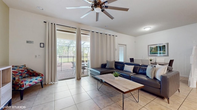 8806 Geneve Ct, Kissimmee, FL 34747 - living area with light tile patterned flooring and a ceiling fan