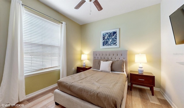 8806 Geneve Ct, Kissimmee, FL 34747 - bedroom featuring wood finished floors and a ceiling fan