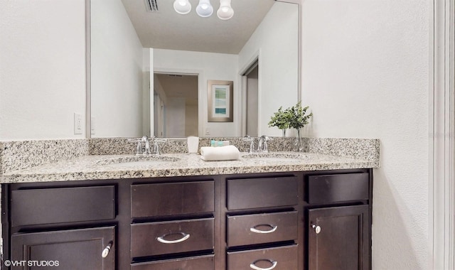 8806 Geneve Ct, Kissimmee, FL 34747 - full bathroom featuring double vanity