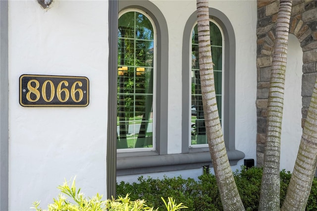 8066 Ludington Cir, Orlando, FL 32836 - doorway to property featuring stucco siding and stone siding