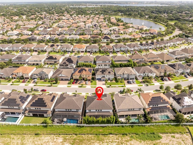 8066 Ludington Cir, Orlando, FL 32836 - aerial perspective of suburban area with a large body of water