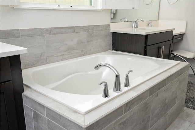 8066 Ludington Cir, Orlando, FL 32836 - bathroom featuring vanity and a garden tub