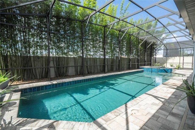 8066 Ludington Cir, Orlando, FL 32836 - view of swimming pool featuring a fenced backyard, a lanai, a pool with connected hot tub, and a patio area