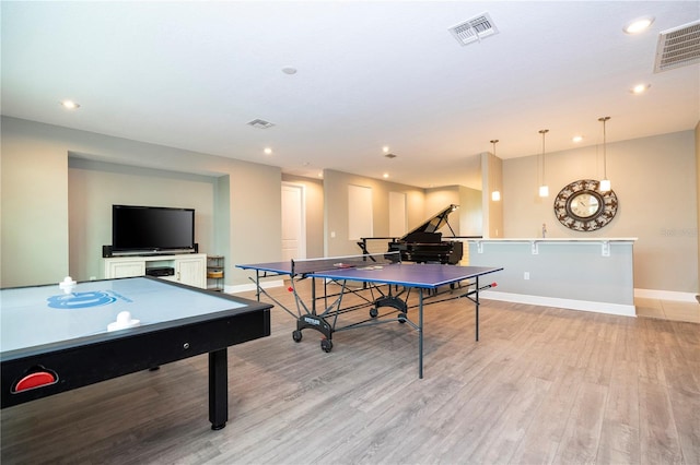 8066 Ludington Cir, Orlando, FL 32836 - recreation room with light wood finished floors and recessed lighting