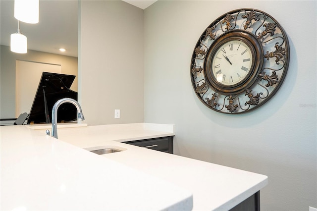 8066 Ludington Cir, Orlando, FL 32836 - kitchen featuring light countertops, hanging light fixtures, and recessed lighting