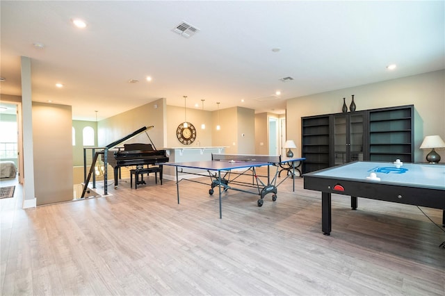 8066 Ludington Cir, Orlando, FL 32836 - game room featuring wood finished floors and recessed lighting